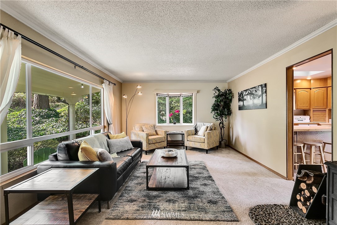 16404 Southeast 135th Street Renton, WA 98059 - Photo 4 of 22 a living room with furniture and a large window
