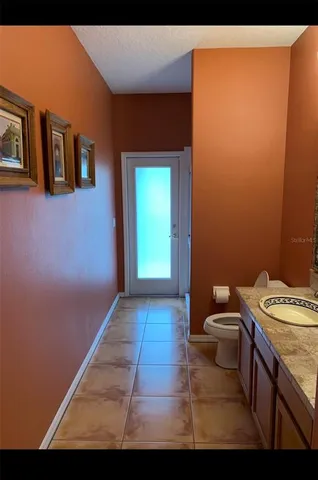 a bathroom with a sink and a toilet