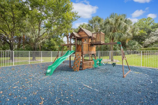 a view of a park with swings