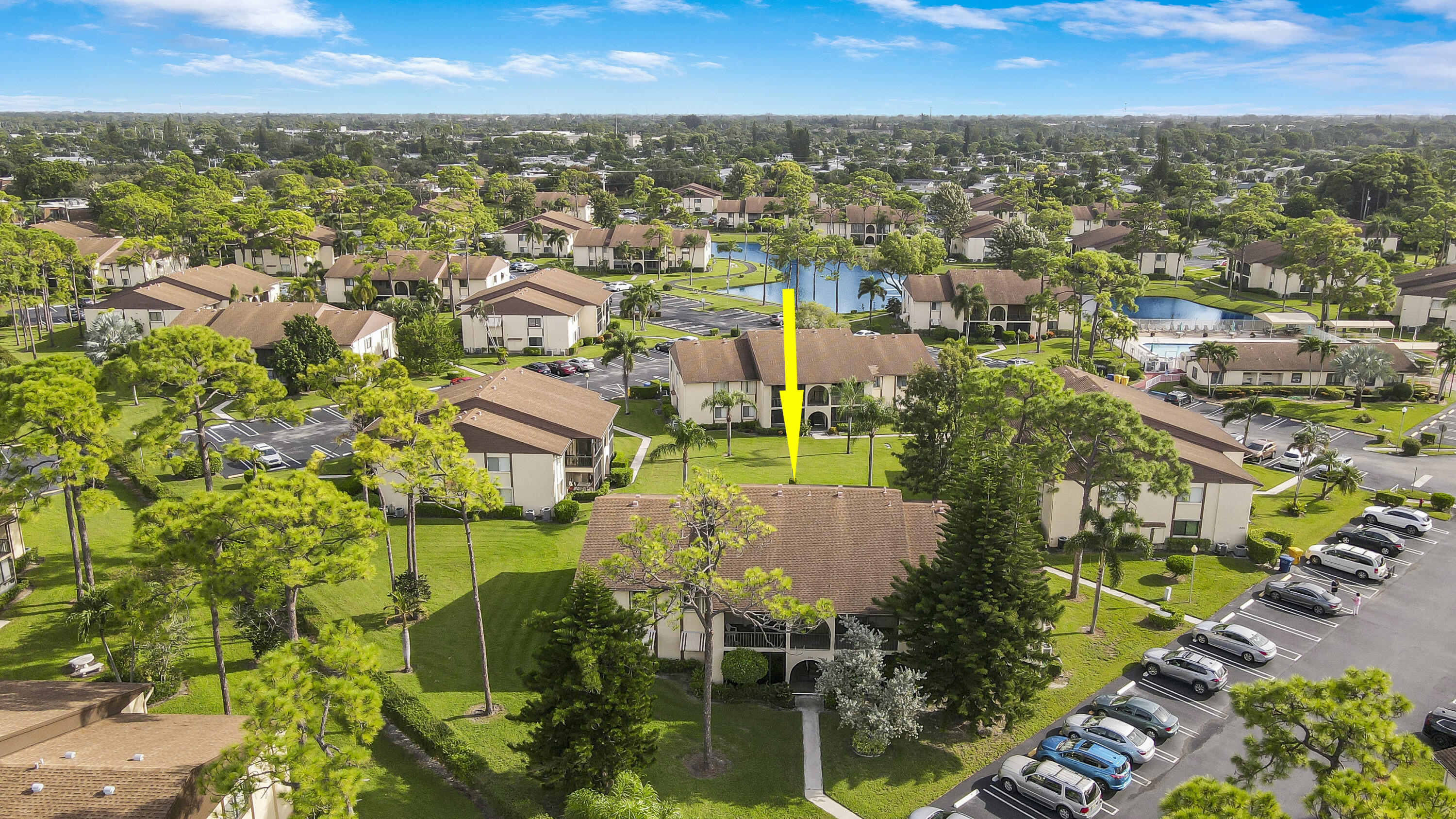 335 Knotty Pine Circle, Unit D1 Greenacres, FL 33463 - Photo 15 of 18 an aerial view of residential houses with outdoor space