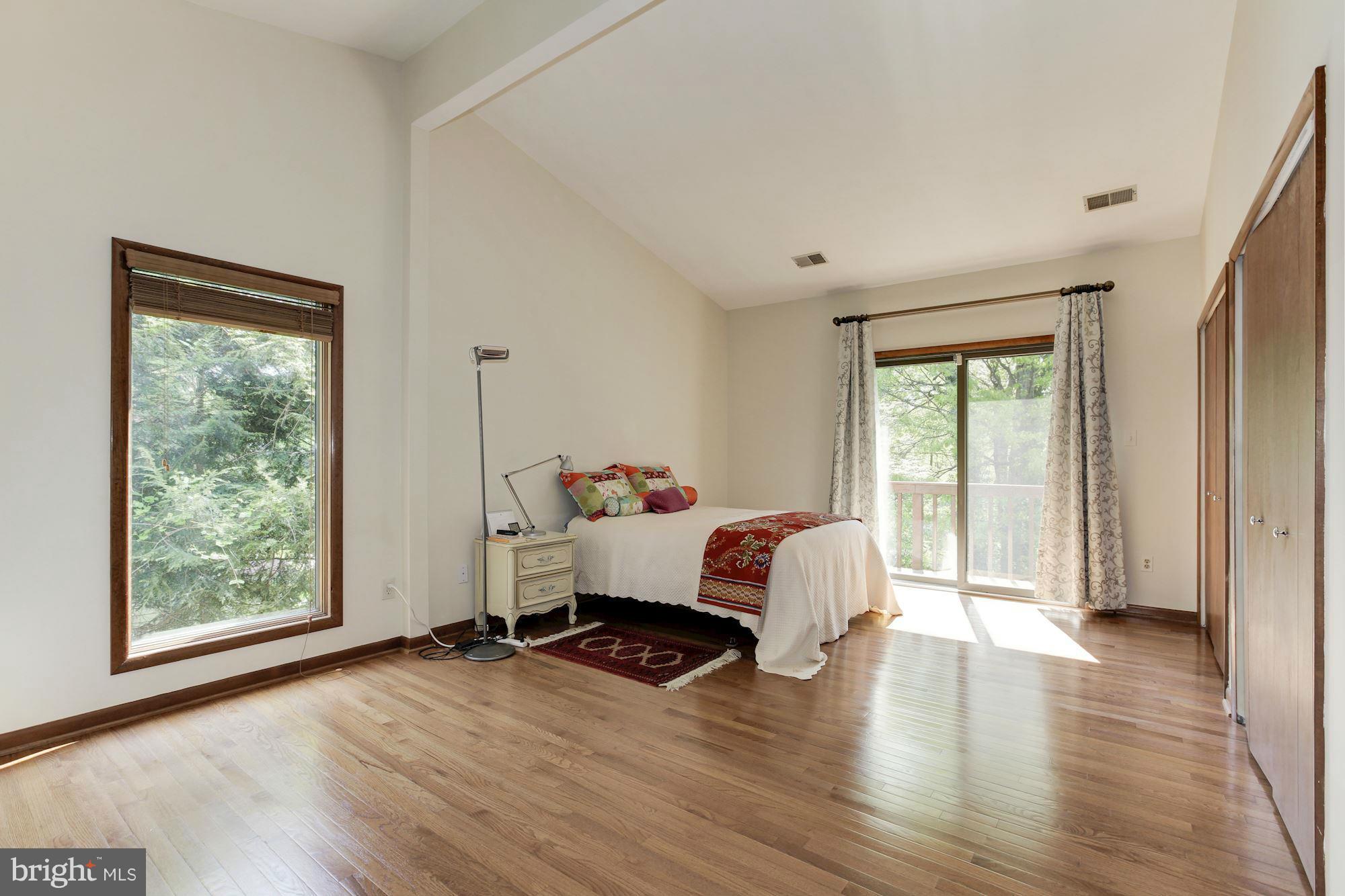 6627 Old Chesterbrook Road McLean, VA 22101 - Photo 18 of 28 Large windows looking out to trees