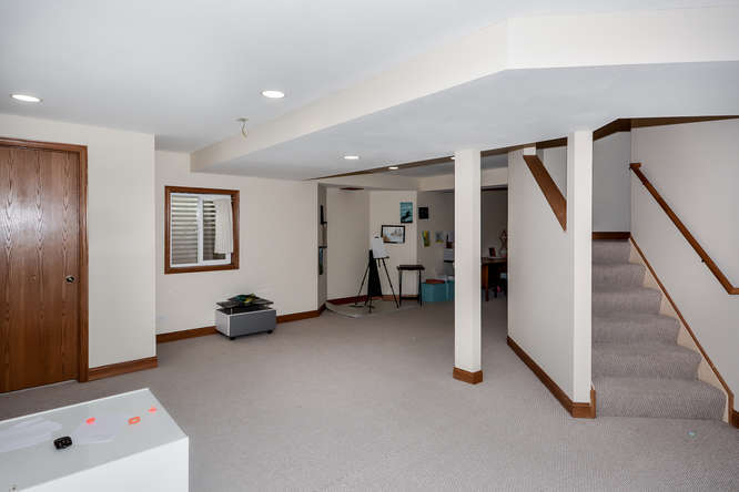796 Teasel Lane Aurora, IL 60504 - Photo 25 of 37 a view of livingroom with furniture and stairs
