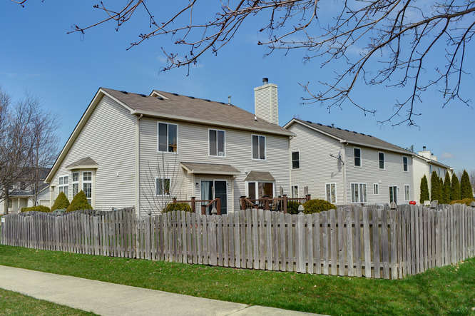 796 Teasel Lane Aurora, IL 60504 - Photo 30 of 37 a front view of a house with a garden