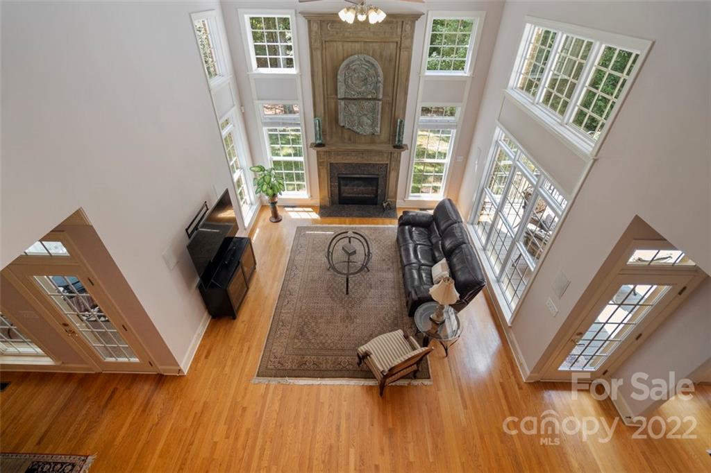 312 Devonport Drive Matthews, NC 28104 - Photo 14 of 48 a living room with furniture and a fireplace