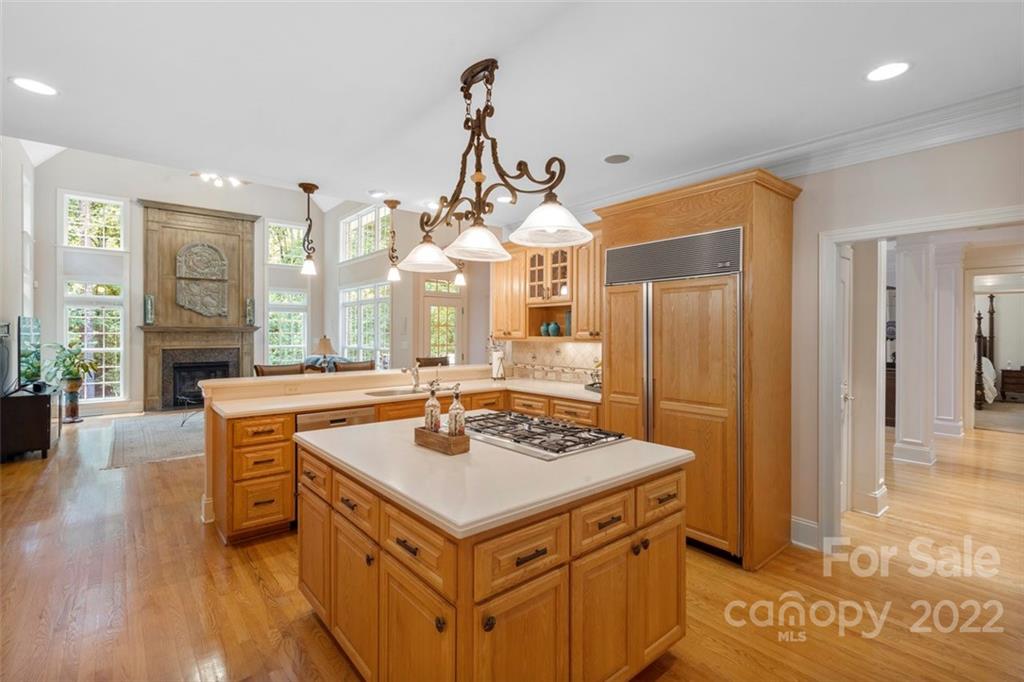 312 Devonport Drive Matthews, NC 28104 - Photo 20 of 48 a kitchen that has a lot of cabinets in it
