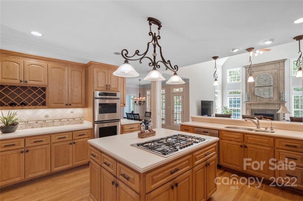 312 Devonport Drive Matthews, NC 28104 - Photo 21 of 48 a kitchen with a stove and a sink