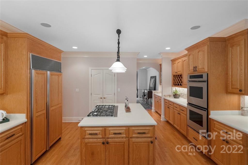 312 Devonport Drive Matthews, NC 28104 - Photo 22 of 48 a kitchen with a stove a refrigerator and a oven