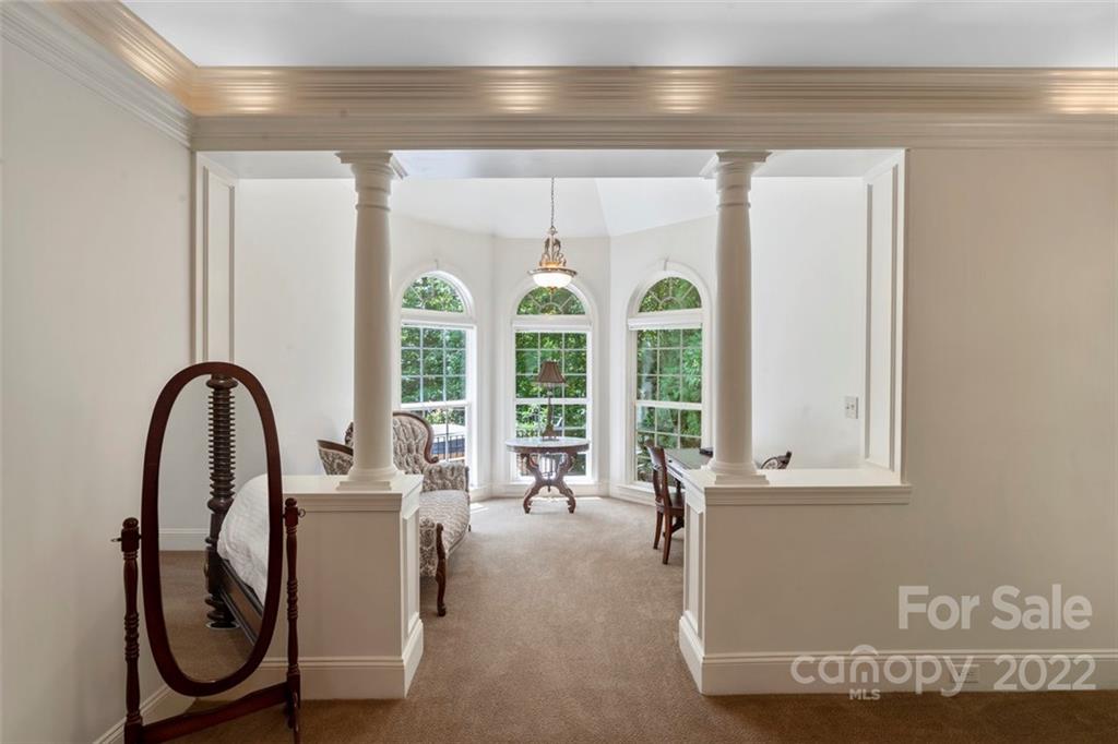 312 Devonport Drive Matthews, NC 28104 - Photo 27 of 48 a living room with furniture and a large window