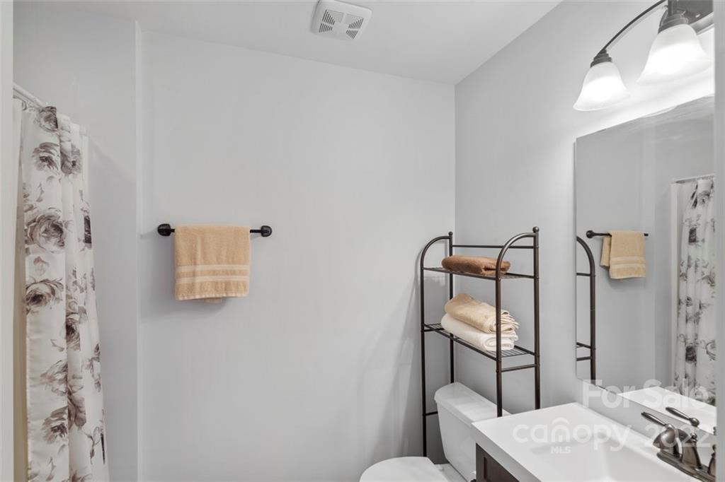 312 Devonport Drive Matthews, NC 28104 - Photo 36 of 48 a bathroom with a sink toilet and shower