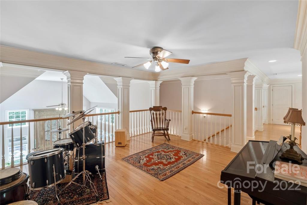 312 Devonport Drive Matthews, NC 28104 - Photo 38 of 48 a view of livingroom with furniture and workspace