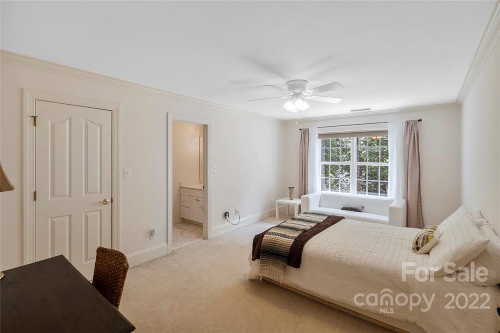 312 Devonport Drive Matthews, NC 28104 - Photo 40 of 48 a bedroom with a bed and a window