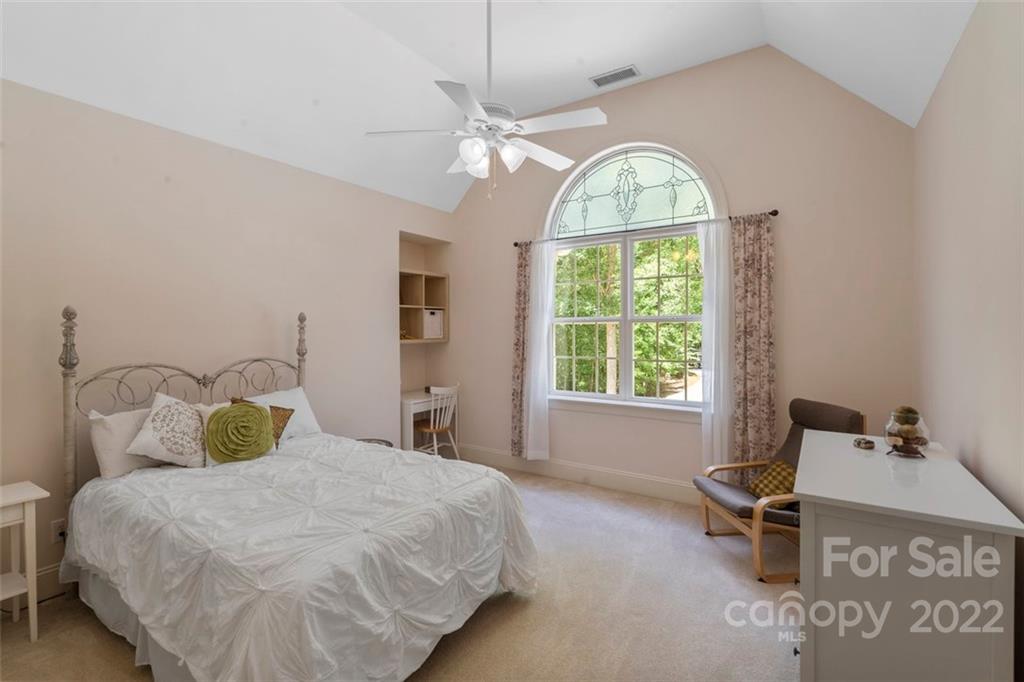 312 Devonport Drive Matthews, NC 28104 - Photo 41 of 48 a bedroom with a bed and a window