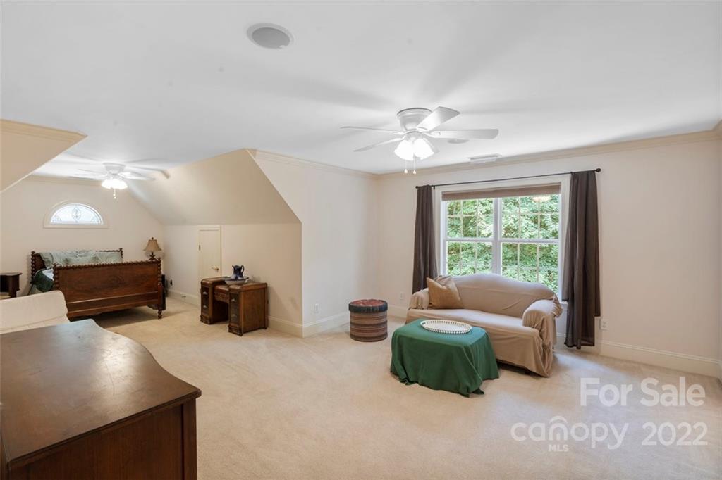 312 Devonport Drive Matthews, NC 28104 - Photo 42 of 48 a living room with furniture and a window
