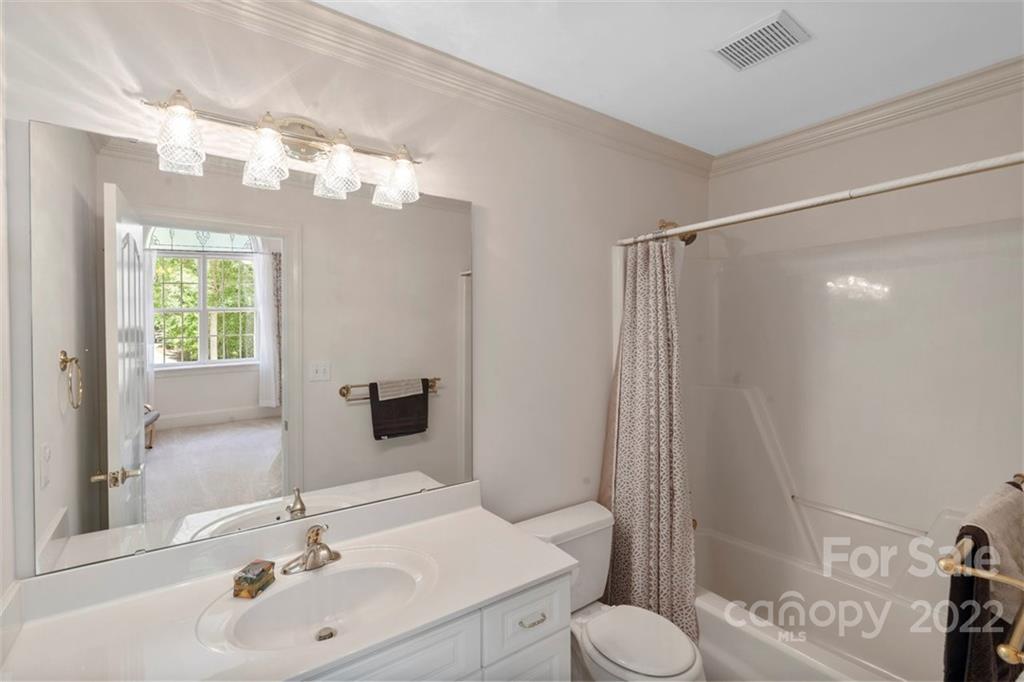 312 Devonport Drive Matthews, NC 28104 - Photo 45 of 48 a bathroom with a sink toilet and shower