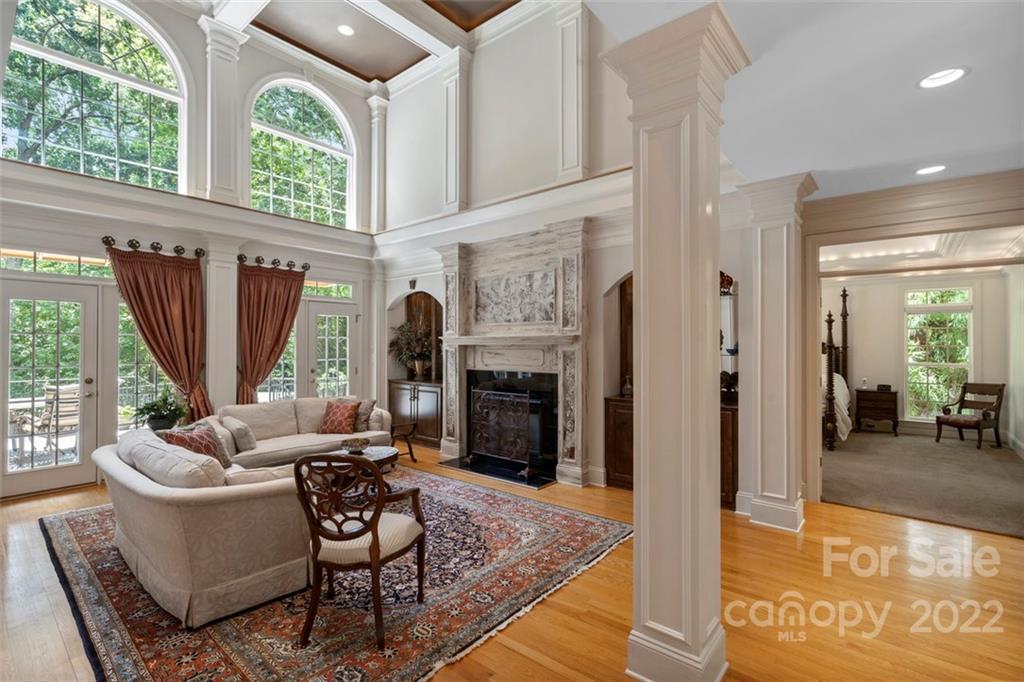 312 Devonport Drive Matthews, NC 28104 - Photo 6 of 48 a living room with furniture fireplace and window