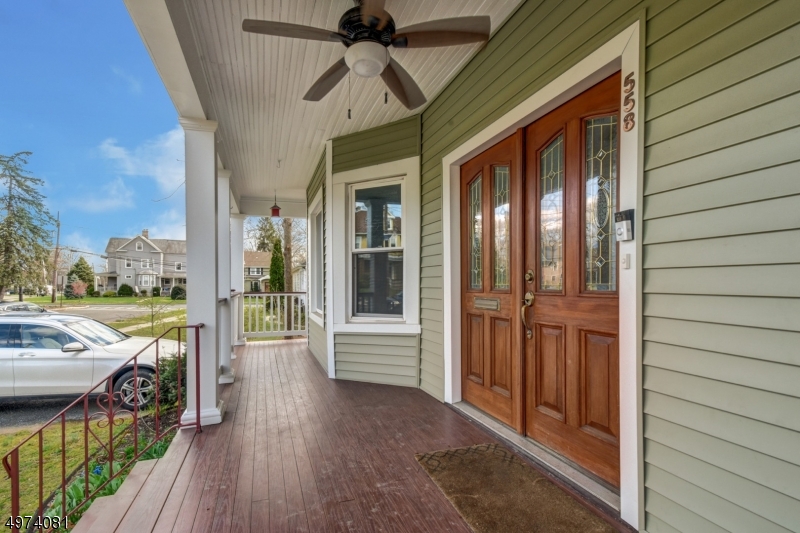 558 Summit Avenue, Unit 1 Westfield, NJ 07090 - Photo 2 of 13 a view of a balcony with furniture and garden