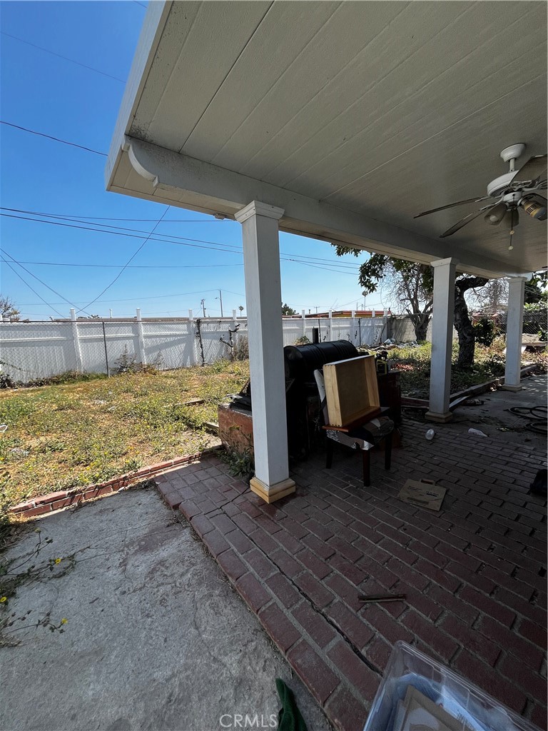 1609 West 166th Street Compton, CA 90220 - Photo 12 of 19 BACK YARD, FENCED AND PRIVATE WITH COVERED PATIO AREA