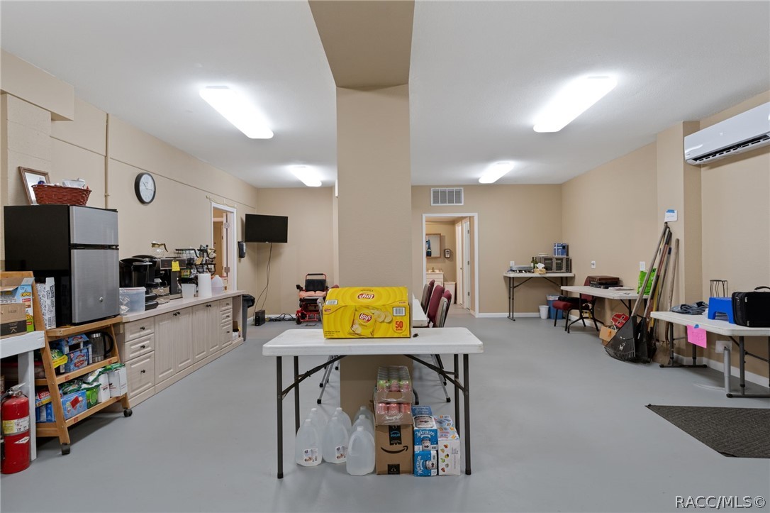 4530 South Florida Avenue Inverness, FL 34450 - Photo 62 of 100 a living room with furniture and a flat screen tv