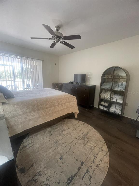 25068 Harbor View Road, Unit 3D Punta Gorda, FL 33980 - Photo 19 of 24 a bedroom with bed and window