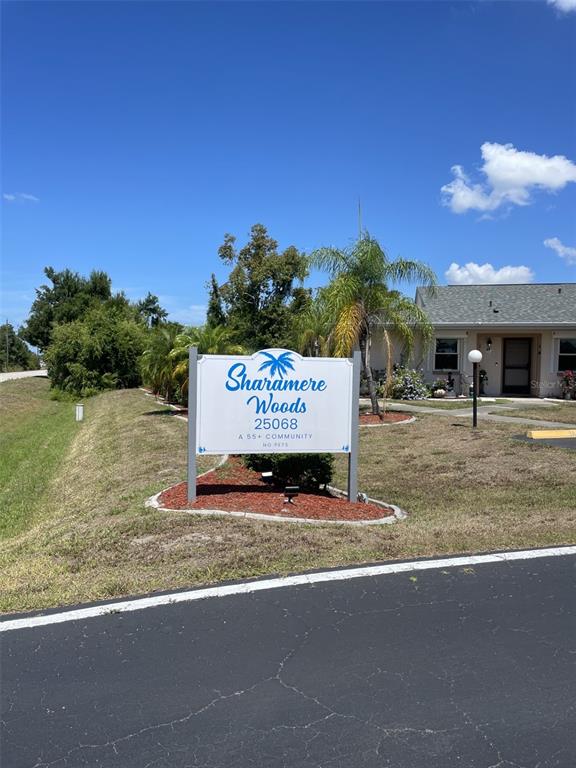 25068 Harbor View Road, Unit 3D Punta Gorda, FL 33980 - Photo 2 of 27 a sign on the side of a building