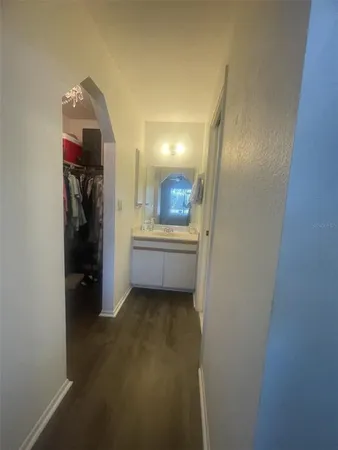 a en suite bathroom with a sink and mirror