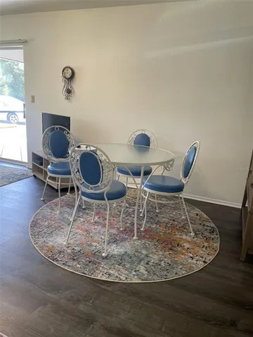 a view of a dining room with furniture