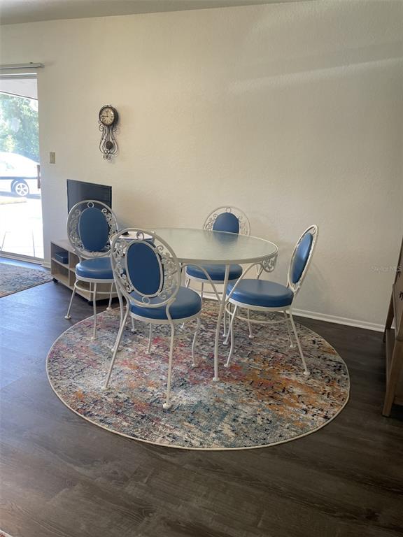 25068 Harbor View Road, Unit 3D Punta Gorda, FL 33980 - Photo 4 of 27 a view of a dining room with furniture