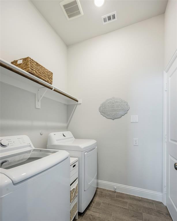 1617 Hitching Post Road Weston, TX 75009 - Photo 15 of 30 a utility room with dryer and washer