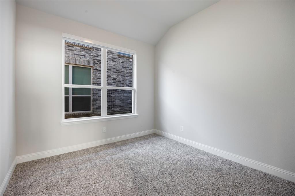 1617 Hitching Post Road Weston, TX 75009 - Photo 21 of 30 a view of an empty room with a window