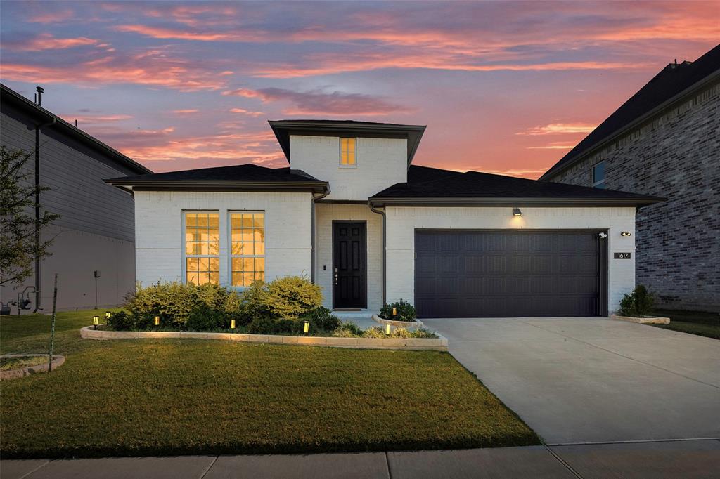 1617 Hitching Post Road Weston, TX 75009 - Photo 3 of 30 a front view of a house with garden