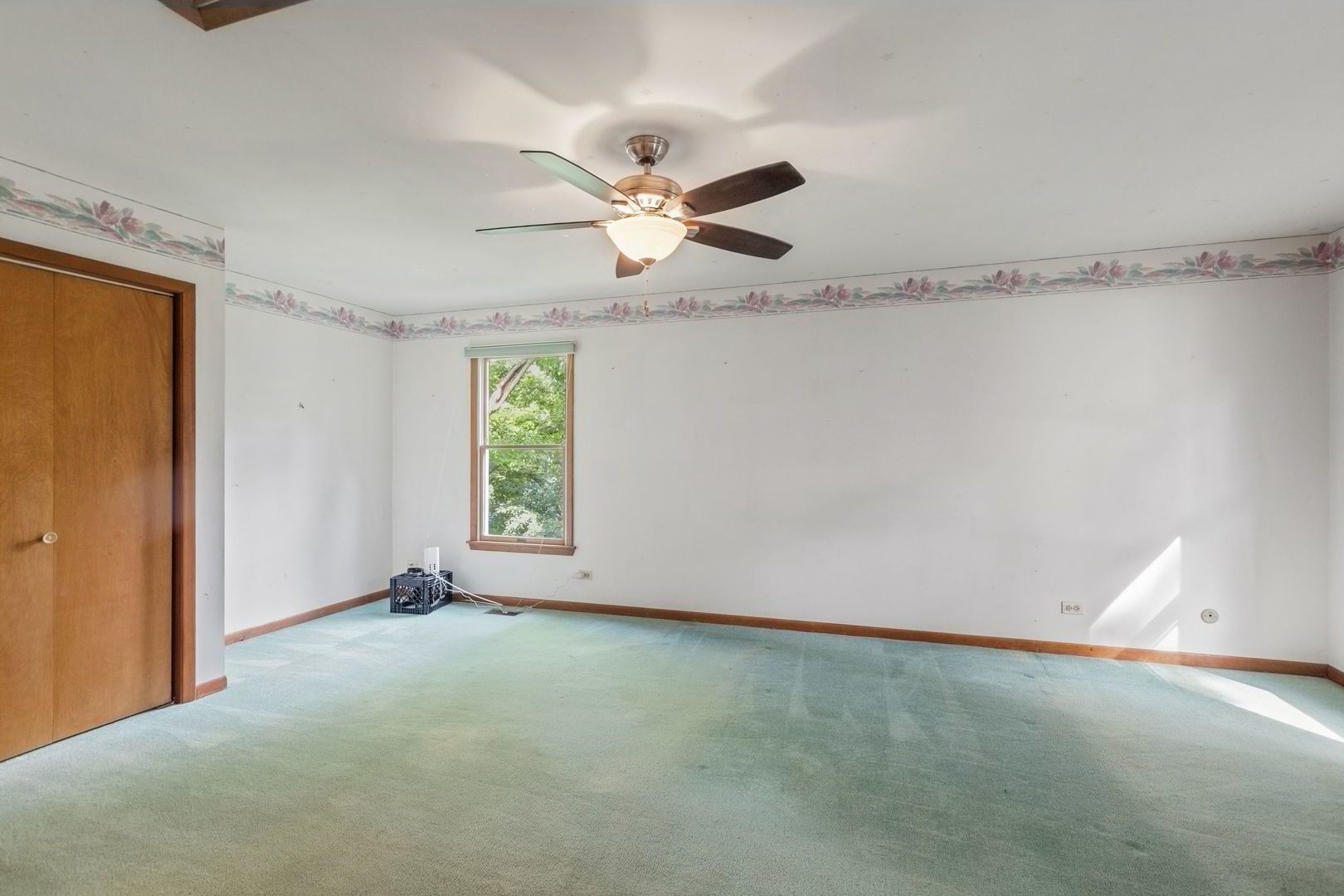 7062 Osage Road Long Grove, IL 60060 - Photo 14 of 25 a view of an empty room with a window