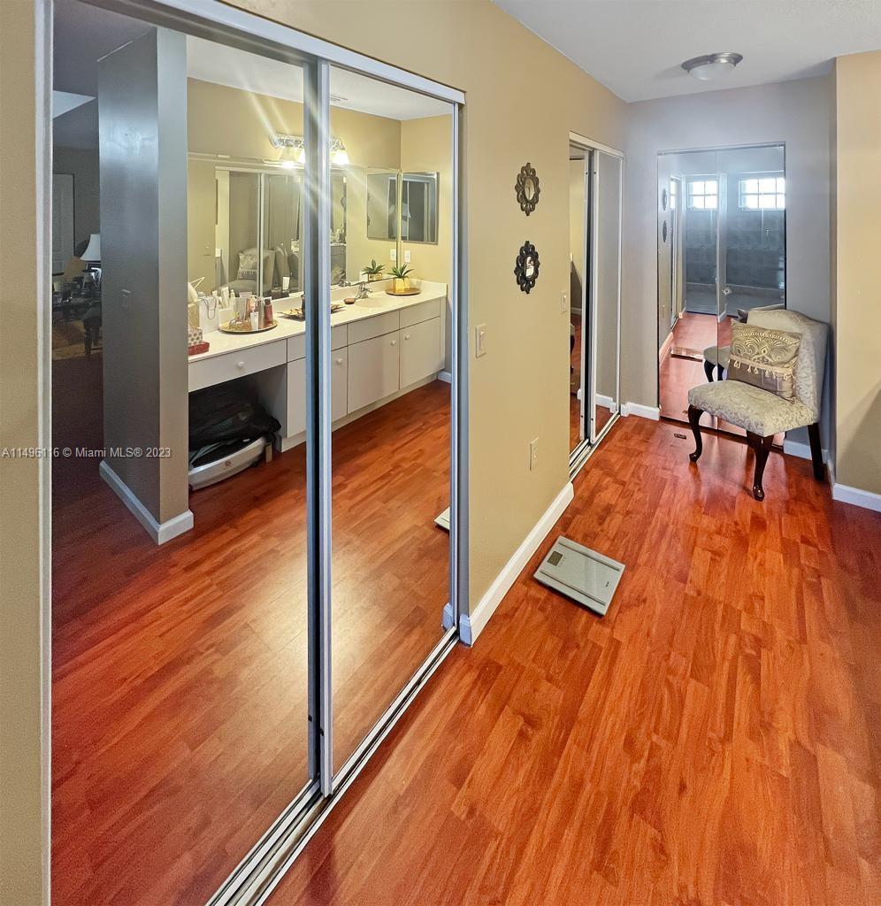 The Hammocks Miami, FL 33196 - Photo 13 of 20 a living room with a bed and glass door