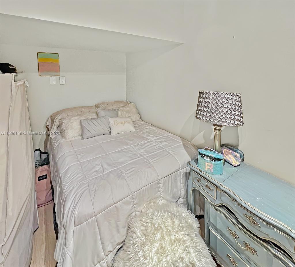 The Hammocks Miami, FL 33196 - Photo 14 of 20 a bedroom with a bed and a dresser