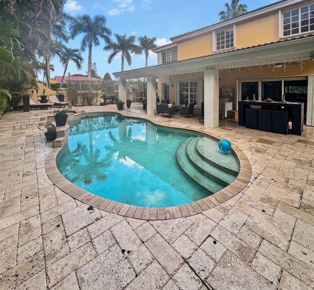 The Hammocks Miami, FL 33196 - Photo 19 of 20 a view of a swimming pool with outdoor seating