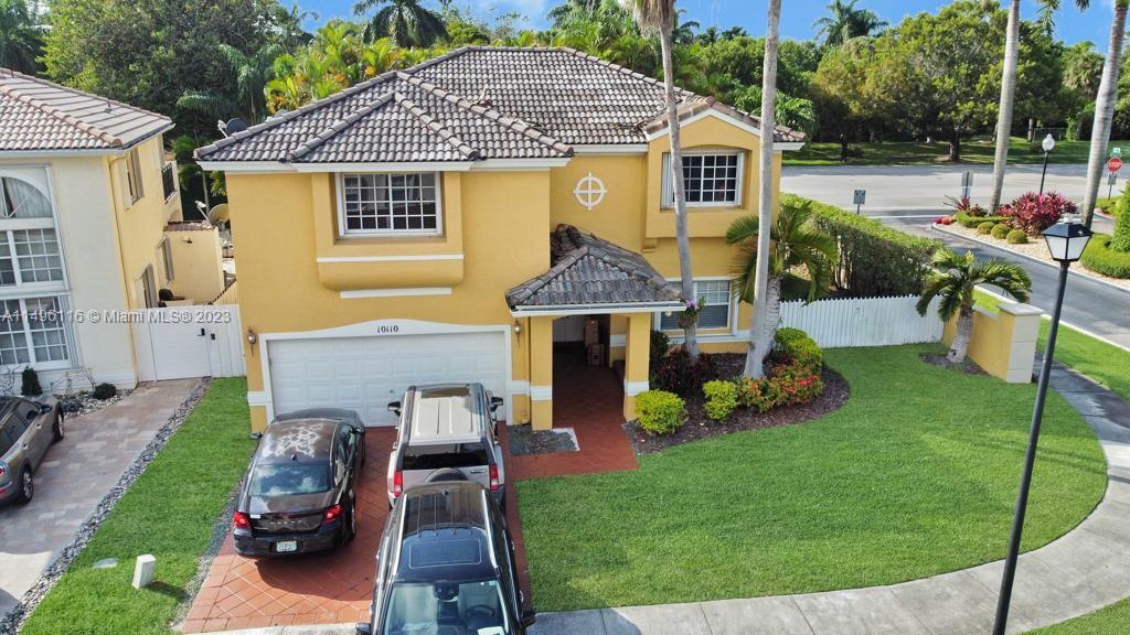 The Hammocks Miami, FL 33196 - Photo 3 of 20 a front view of a house with garden