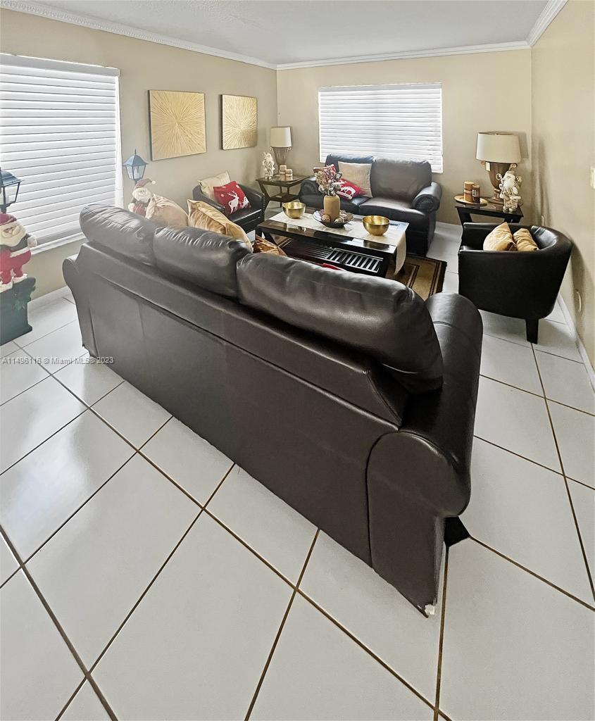 The Hammocks Miami, FL 33196 - Photo 4 of 20 a living room with furniture and a window