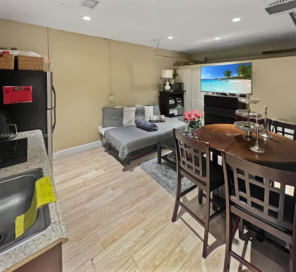 The Hammocks Miami, FL 33196 - Photo 8 of 20 a living room with dining room and wooden floor