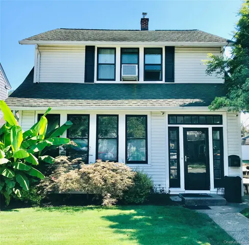 a view of a house with a garden