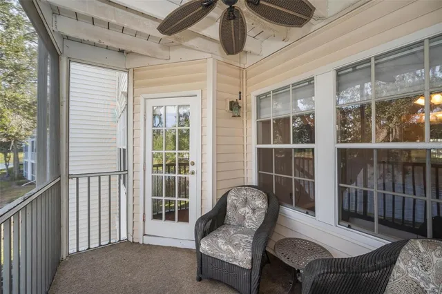 a view of a porch with furniture
