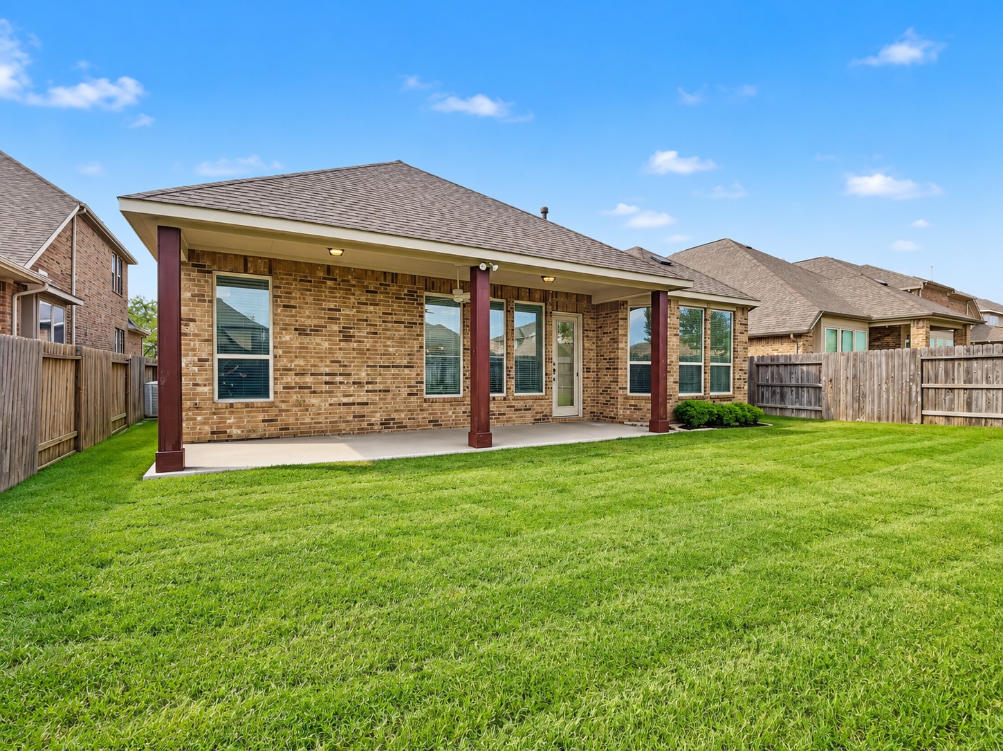 20306 Windsor Field Spring, TX 77379 - Photo 32 of 37 Vast backyard area with a covered patio and no back neighbors