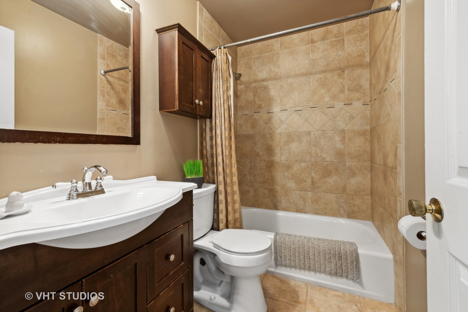 808 Burr Oak Circle Cary, IL 60013 - Photo 15 of 20 a bathroom with a sink toilet and shower