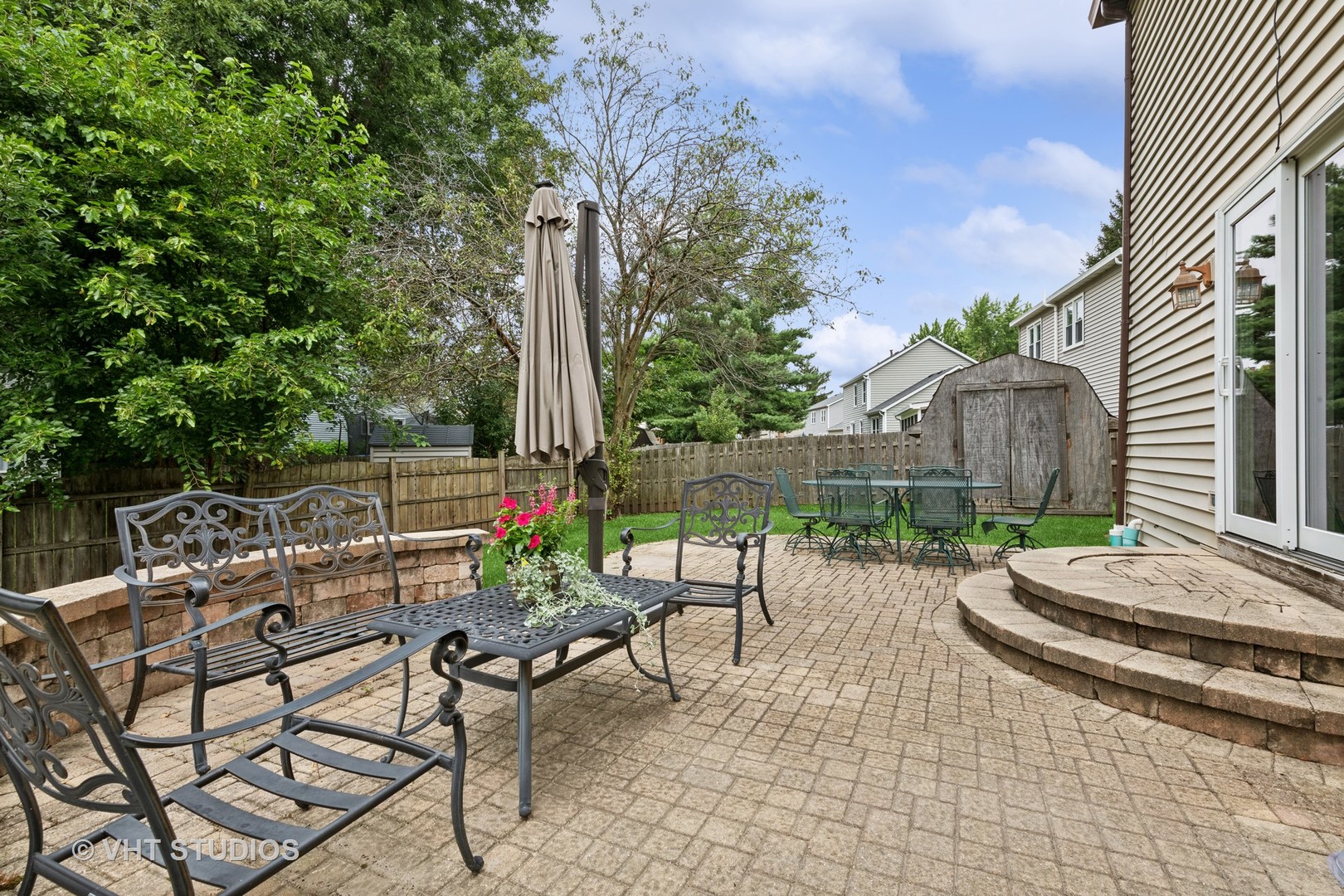 808 Burr Oak Circle Cary, IL 60013 - Photo 18 of 20 a view of backyard with outdoor seating and plants