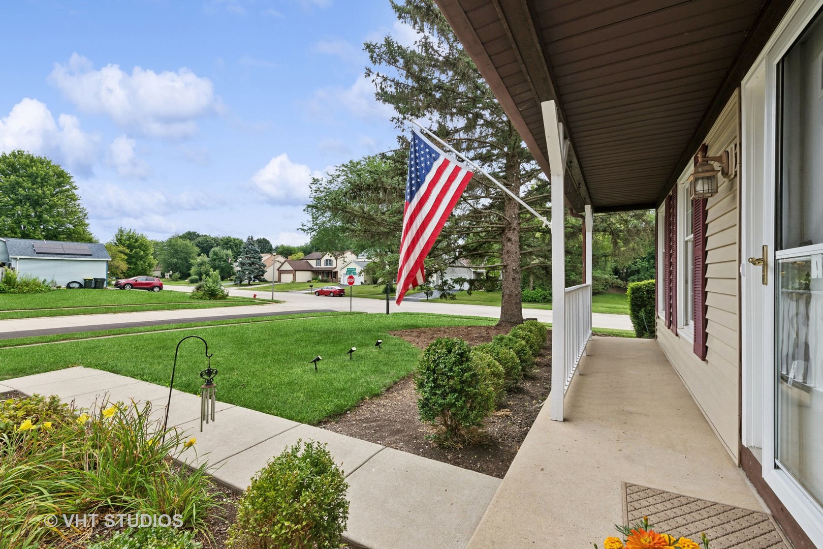 808 Burr Oak Circle Cary, IL 60013 - Photo 2 of 20 a view of a house with a big yard and potted plants