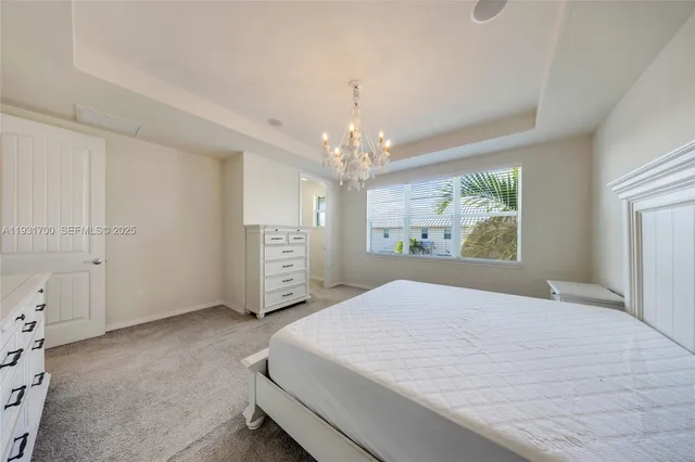 a view of storage and utility room with closet
