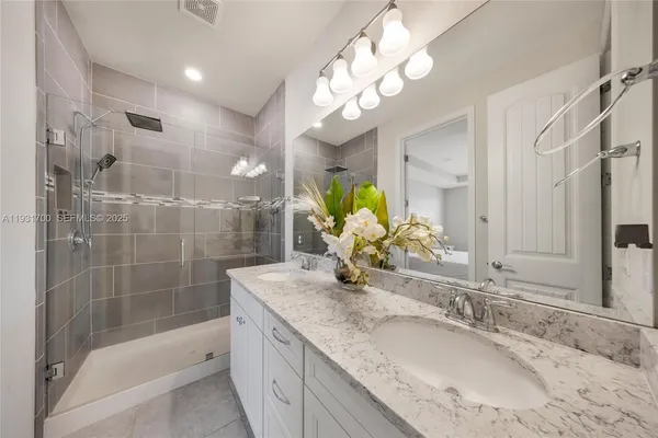 a bedroom with a bed and closet