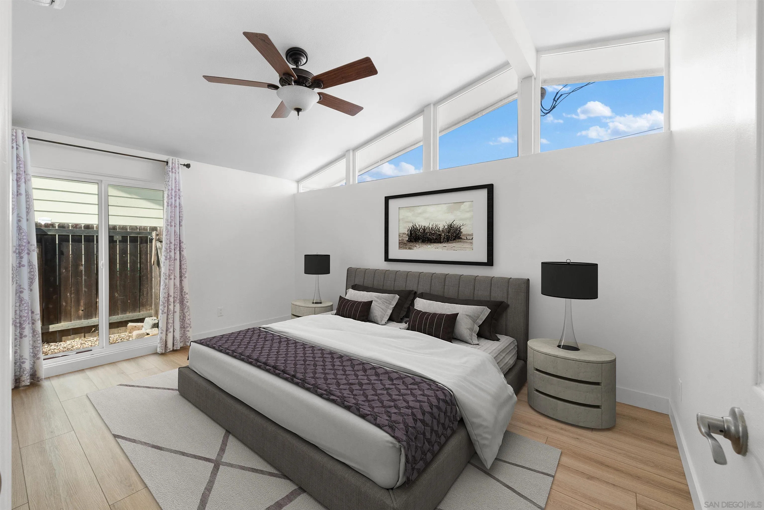9101 Ronda Avenue San Diego, CA 92123 - Photo 12 of 20 a bedroom with a bed and a window