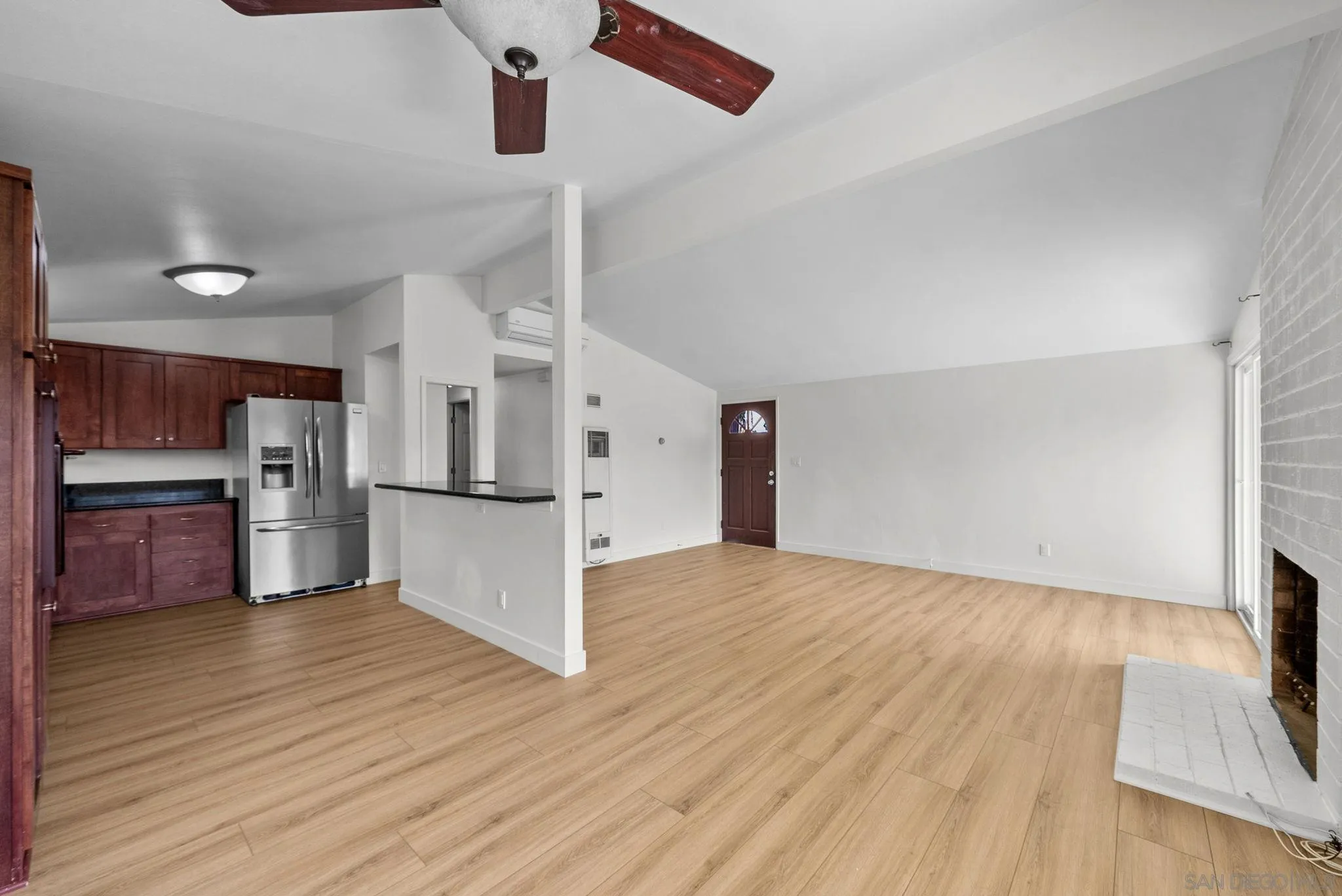9101 Ronda Avenue San Diego, CA 92123 - Photo 5 of 20 a view of kitchen with wooden floor
