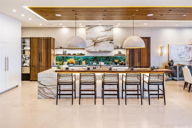 a dinning table and chairs in a room