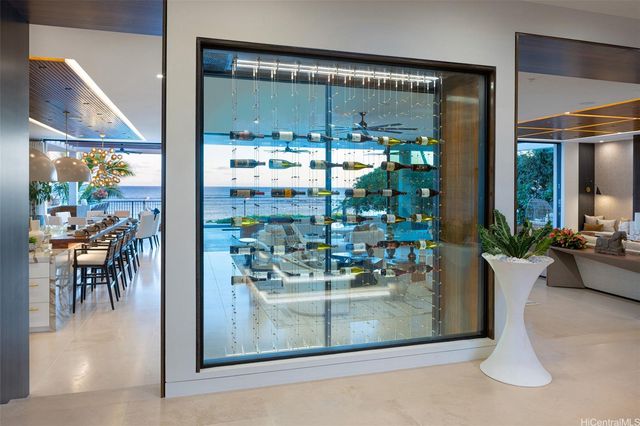 a view of a living room and dining room