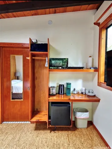 a room with furniture and window